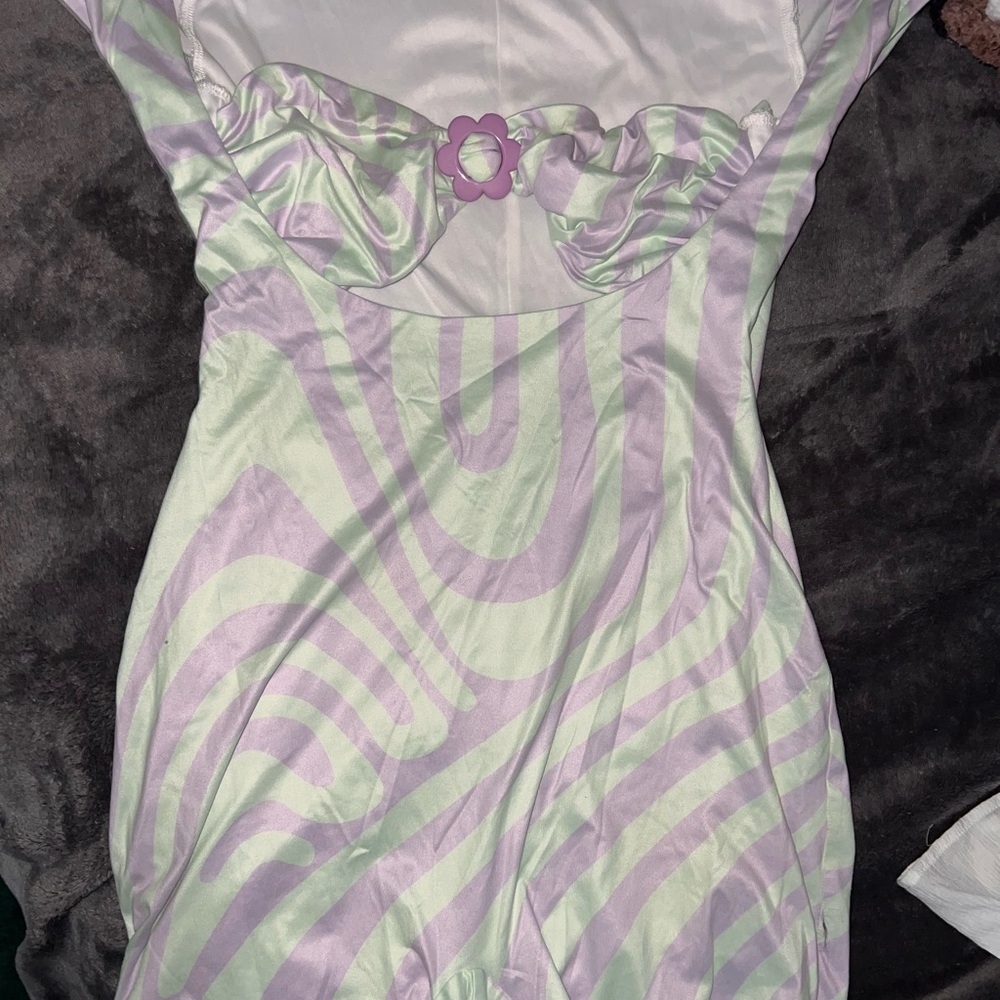 Pastel Swirl Romper with Floral Accent